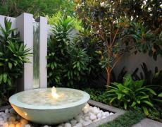 Thiết kế tường nước: Đài phun nước trang trí sân vườn bằng chậu cây